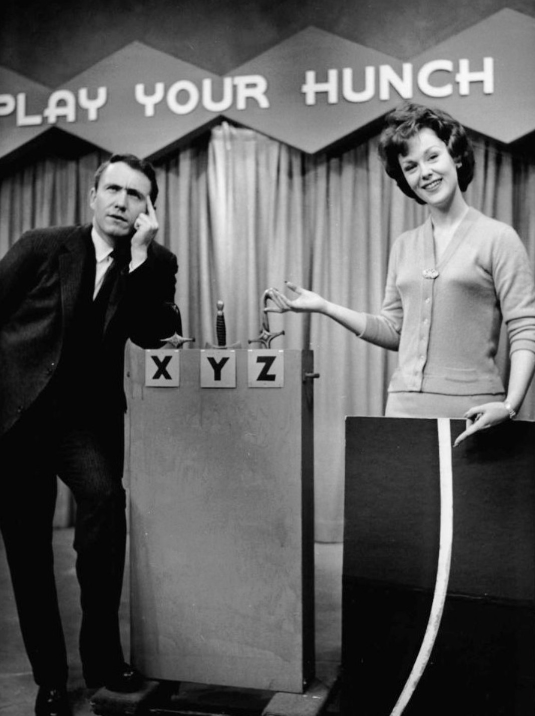 Game show “Play Your Hunch” with host Griffin and Liz Gardner. 